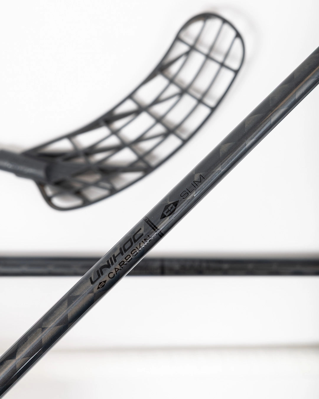 Unihoc UNILITE CARBSKIN FL 26 SORT SLIM 26/27